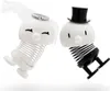 Two spring-loaded figurines dressed as a bride and groom. Produktbild-Vorschau