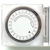 A close-up, top-down view of a 24-hour mechanical timer. Produktbild-Vorschau