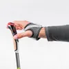 A close-up of a hand holding a Nordic walking pole. Produktbild-Vorschau