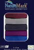 A stack of folded blankets in different colors, with brand logo and product description text. Produktbild-Vorschau