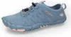 A single blue athletic shoe with pink accents is shown against a white background. Podgląd zdjęcia produktu