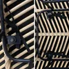 Close-up views of the connection points and weaving of a rattan and metal bar stool. Anteprima dell’immagine prodotto