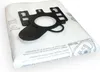 A close-up of a white vacuum cleaner bag with a black plastic adapter attached. Produktbild-Vorschau