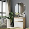 A modern living room scene featuring a sideboard with decorative items and a large plant. Voir les images du produit