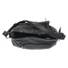 A black handbag is shown from a top-down angle, with its main compartment open. Náhled obrázku produktu