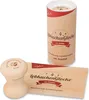 A wooden Lebkuchenglocke (gingerbread mold) with its packaging and a recipe card. Produktbild-Vorschau