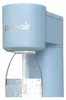 A close-up shot of a light blue soda maker with a clear bottle filled with water. Podgląd zdjęcia produktu