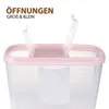 A close-up view of the top of a clear plastic food storage container with a pink lid and two open flip-top lids. Anteprima dell’immagine prodotto