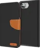 A black flip case for a smartphone, with a brown leather strap and a small brown logo on the front. Anteprima dell’immagine prodotto