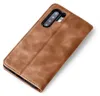 A brown leather flip case for a smartphone, shown from a diagonal angle. Produktbild-Vorschau