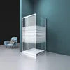 A modern bathroom scene with a shower cabin and a chair. Produktbild-Vorschau