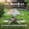 A pug dog resting on an elevated outdoor dog bed with a canopy in a grassy yard. Produktbild-Vorschau