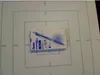 A Pentel EnerGel BL77 pen in its packaging is placed on a grid paper. Anteprima dell’immagine prodotto