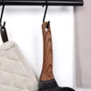Kitchen utensils hanging on a rack. Náhľad obrázku produktu