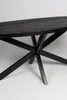 A close-up, studio shot of a black oval dining table with a black metal starburst base, set against a white background. Voir les images du produit
