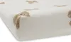 A close-up view of a white changing pad cover with a teddy bear pattern. Produktbild-Vorschau