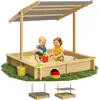 Two children playing in a wooden sandbox with a canopy. Produktbild-Vorschau