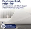 A close-up view of a white mattress topper with a section lifted to reveal its underside, with text overlays highlighting features. Produktbild-Vorschau