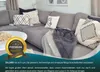 A sectional sofa with decorative pillows and blankets, with a promotional overlay and seal. Produktbild-Vorschau