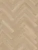 A close-up, top-down view of a light-colored wooden floor laid in a herringbone pattern. Produktbild-Vorschau