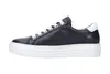 A single black sneaker with white laces and a white sole, shown from the side against a white background. Produktbild-Vorschau