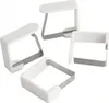 Four white and silver tablecloth clips are arranged diagonally on a white background. Produktbild-Vorschau