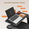 A laptop and accessories are placed on a detachable workstation desktop, which is part of a treadmill. Produktbild-Vorschau