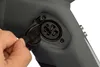 A close-up shot of a hand inserting a plug into a charging port on an e-bike frame. Produktbild-Vorschau
