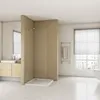 A modern bathroom with a walk-in shower, vanity, and towel rack. Produktbild-Vorschau