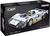 The image shows the packaging of a model car kit. Voir les images du produit