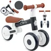A product shot of a children's balance bike/tricycle with multiple views and a color swatch. Produktbild-Vorschau