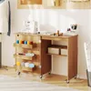 A sewing table with a sewing machine and various sewing supplies. Podgląd zdjęcia produktu