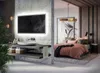 A modern bathroom and bedroom interior, showcasing a vanity with a mirror and a bed. Produktbild-Vorschau