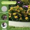 A garden bed with yellow and pink flowers, bordered by a light gray edging and green grass. Produktbild-Vorschau