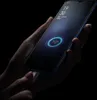 A hand holding a smartphone that is plugged in and charging, with a charging animation displayed on the screen. Produktbild-Vorschau
