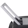 A close-up view of a gray handle extending from a black object, likely a piece of luggage or equipment. Podgląd zdjęcia produktu