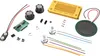 A collection of electronic components for a radio kit, laid out on a white background. Podgląd zdjęcia produktu