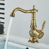 A close-up shot of a brass faucet with water running into a sink. Podgląd zdjęcia produktu