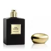 A black perfume bottle with a gold label and a gold cap. Voir les images du produit