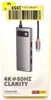 The image shows the packaging of a USB-C hub, with the product itself partially visible. Produktbild-Vorschau