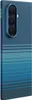 A close-up, angled view of the back of a smartphone case with a textured blue pattern and a camera module. Náhľad obrázku produktu