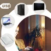A collage of electronic devices and a woman using a laptop in a dimly lit room. Anteprima dell’immagine prodotto