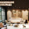 A blurred interior shot of a modern living room with furniture and artwork on the walls. Produktbild-Vorschau