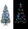 A split image showing a pre-lit fiber optic Christmas tree with a star topper. The left side shows the tree on a white background, and the right side shows the tree on a black background with its lights illuminated. Náhľad obrázku produktu