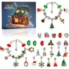 Weihnachts-Adventskalender-Box mit beleuchteter Elfenhaus-Szene, zusammen mit zwei Charm-Armbändern und einer Sammlung einzelner Weihnachtsmotive Voir les images du produit