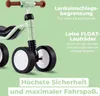 A close-up marketing image of a green Puky balance bike with text overlays highlighting its features. Anteprima dell’immagine prodotto