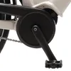 A close-up view of the crankset and chain of a white electric bicycle. Produktbild-Vorschau