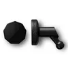 A black magnetic mount for a dashcam, shown with its magnetic attachment piece. Produktbild-Vorschau