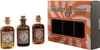 A set of three small gin bottles and their branded box. Produktbild-Vorschau