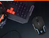 A gaming mouse and keyboard are shown on a black surface. Anteprima dell’immagine prodotto